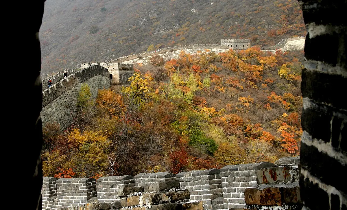 The Great Wall at Mutianyu winding along hills in autumn colours