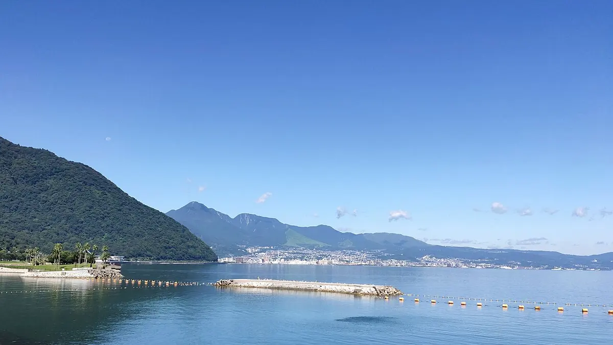 Beppu Bay and the city of Beppu along the shore, seen from Tanoura Beach.
