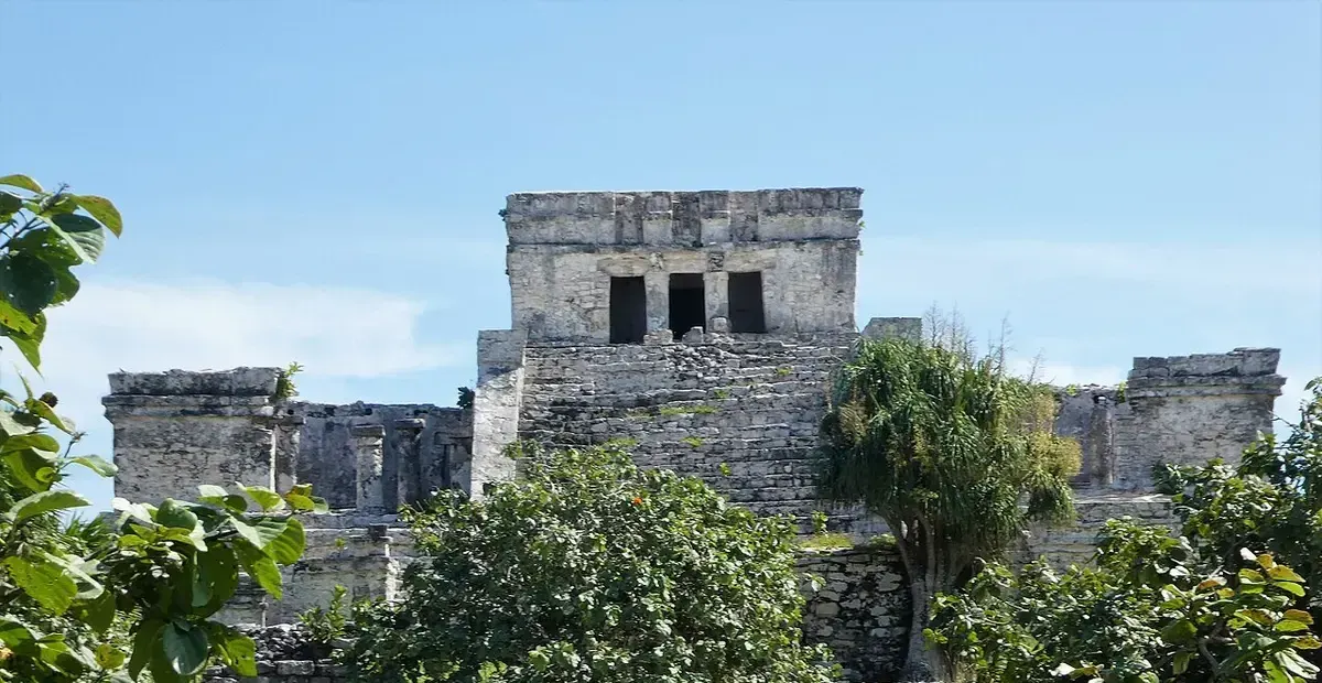 El Castillo at the Tulum archaeological site, standing on a cliff above the Caribbean coast.