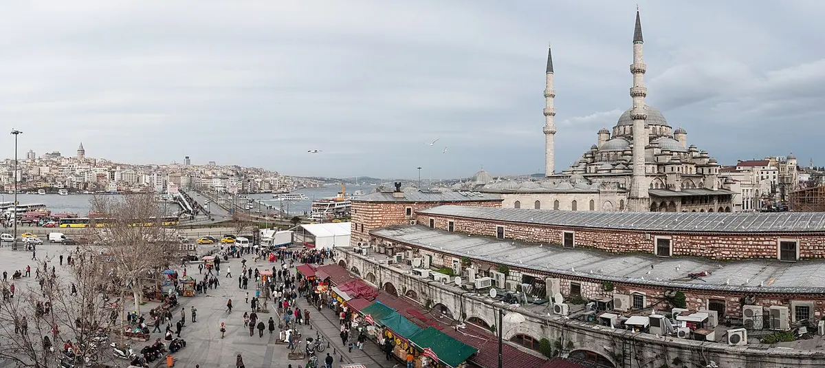 The domes and minarets of Yeni Cami beyond the Galata Bridge, on the Istanbul old-city skyline