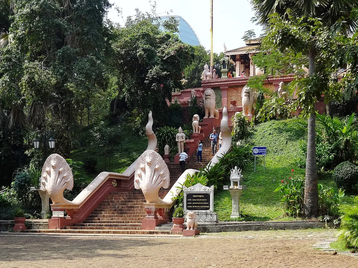 Wat Phnom temple on its wooded hill in Phnom Penh.