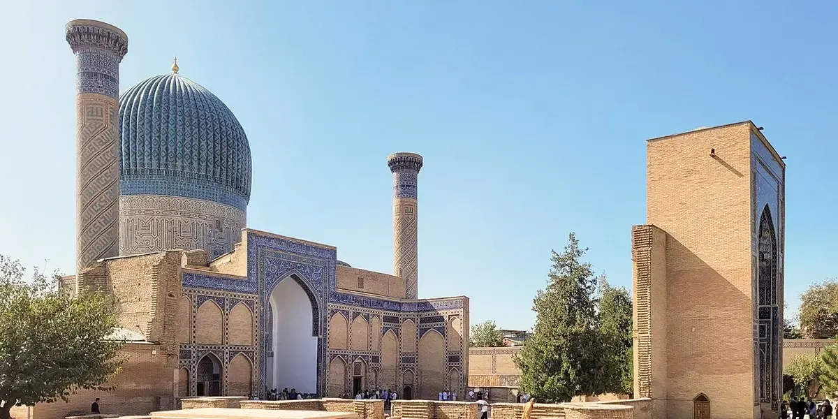 The Gur-Emir Mausoleum in Samarkand with its ribbed turquoise dome and tiled portal.