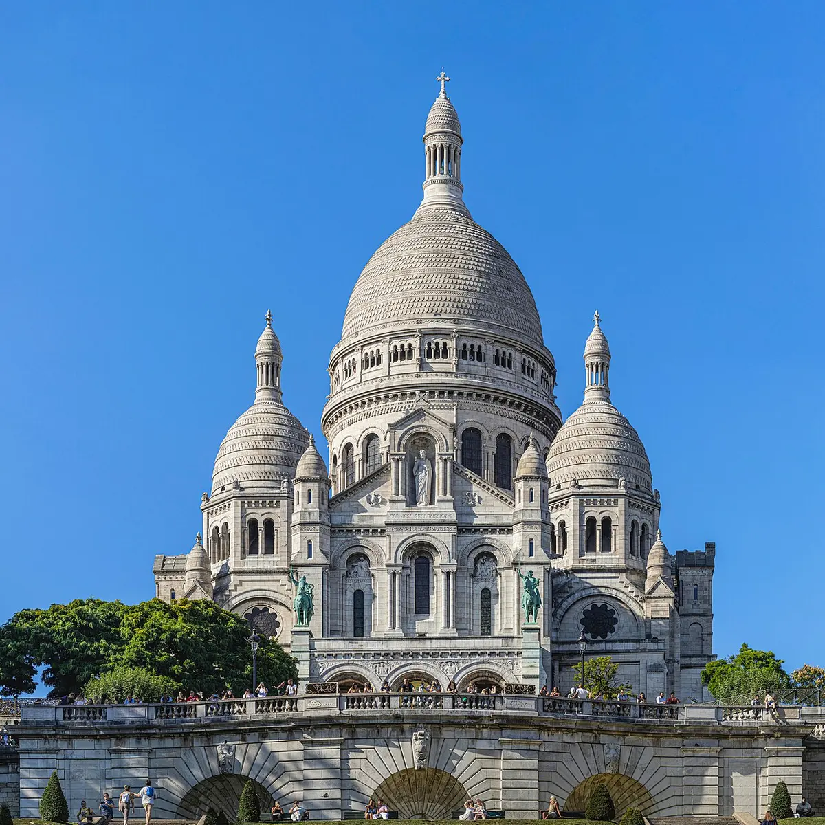 The white south facade of Sacré-Cœur Basilica atop the hill of Montmartre.